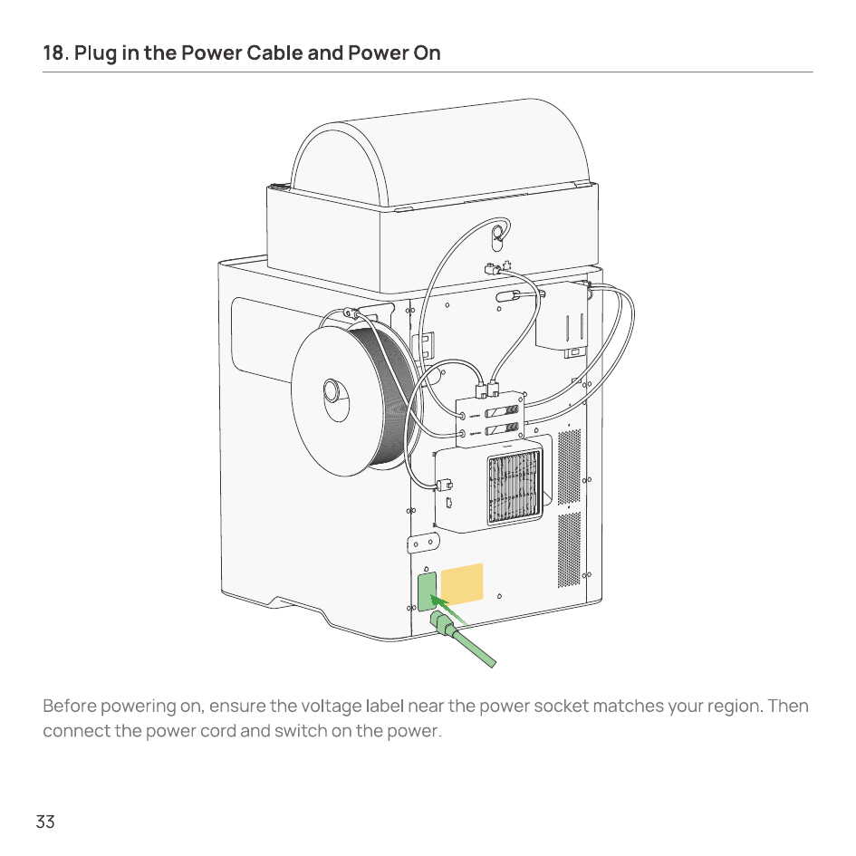 Connecting the power cord to the socket at the rear of the printer